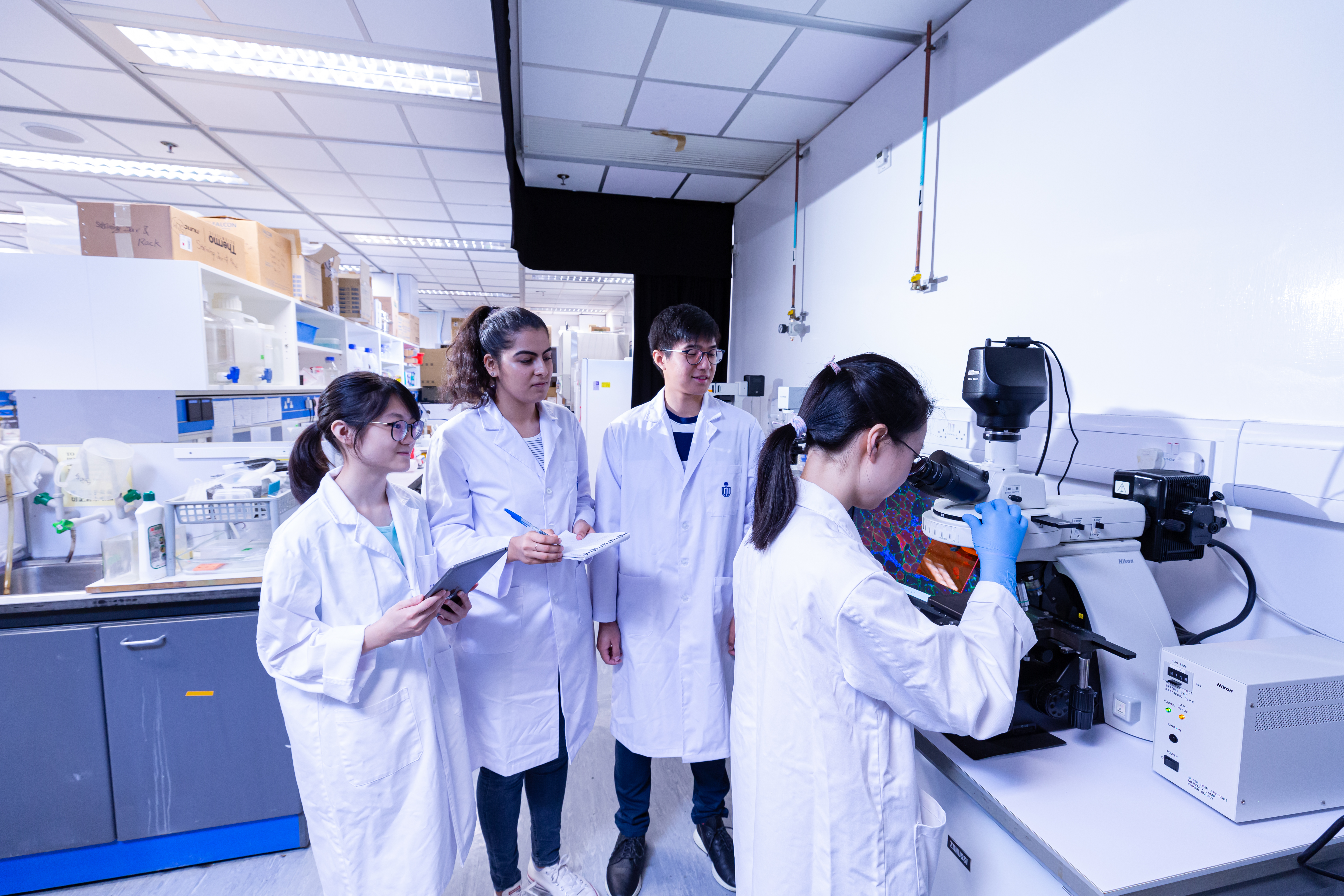 HKUST students in a lab doing an experiement